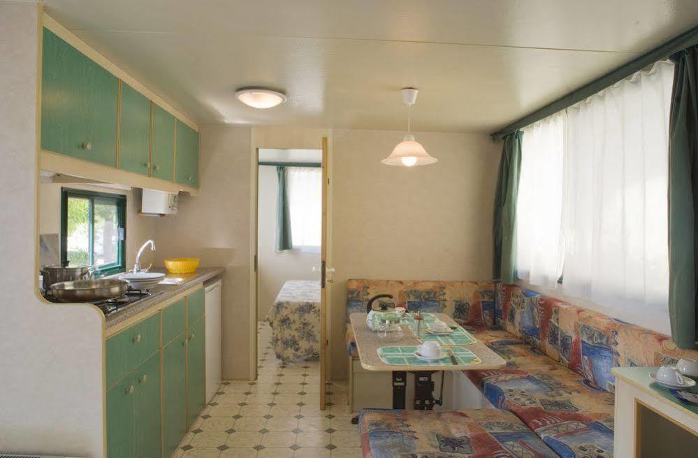 Happy Camp Mobile Homes In Cisano San Vito Campsite